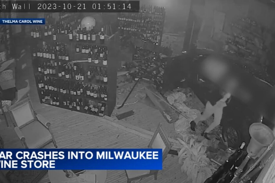 Surveillance video captured the moment a car slammed into a Wisconsin wine store early Saturday morning.