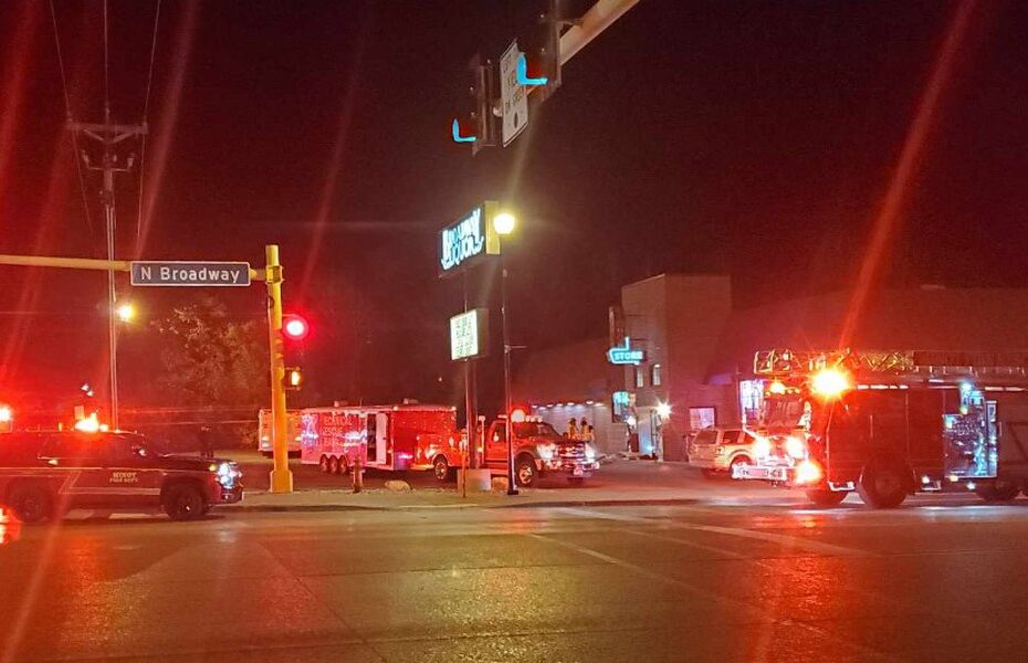 Minot Police have arrested a man they say crashed a vehicle into Broadway Liquor on Monday night.