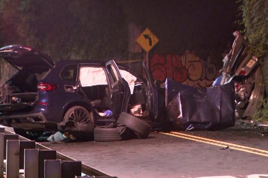 The crash involved a blue SUV and light brown car, which was completely smashed against a wall.